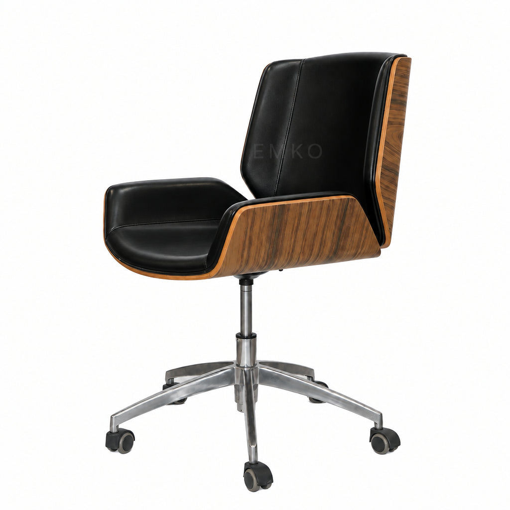A mid-century modern office chair featuring a black leather seat and backrest, a polished wood grain side panel, and a chrome five-star wheeled base, photographed against a plain white studio background.